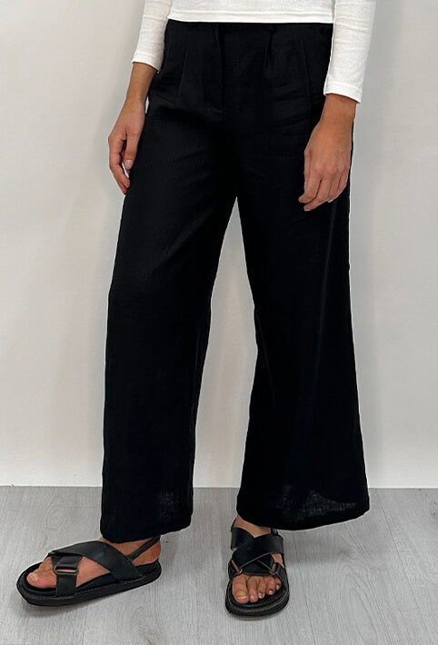 Edith Linen Culottes in black is 100% Linen with elastic waistband at back, only slightly cropped, button and zip enclosure at front and 2 side pockets