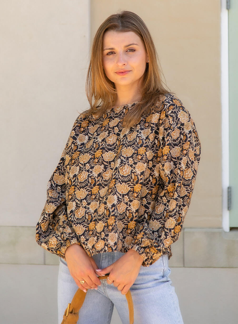 Tha Tiffany top in exclusive paisley black, tan, beige print features long sleeves with elasticised cuff, button through back yoke, shoulder detailing and breathable soft washed linen.