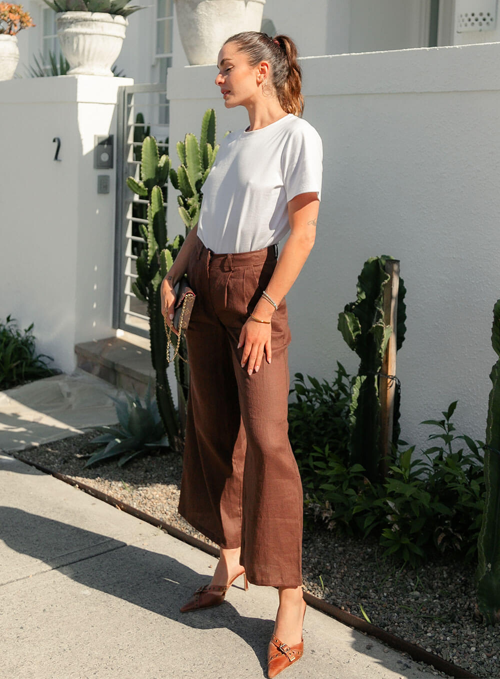 Edith Linen Culottes in chocolate is 100% Linen with elastic waistband at back, only slightly cropped,  button and zip enclosure at front and 2 side pockets