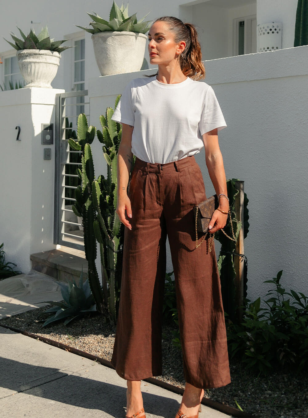 Edith Linen Culottes in chocolate is 100% Linen with elastic waistband at back, only slightly cropped,  button and zip enclosure at front and 2 side pockets