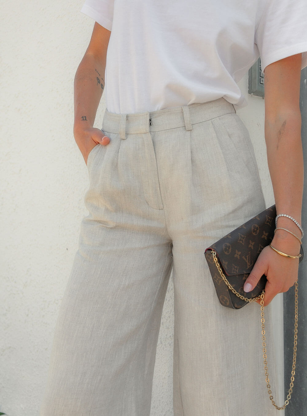 Edith Linen Culottes in beige is 100% Linen with elastic waistband at back, only slightly cropped,  button and zip enclosure at front and 2 side pockets