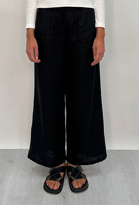 Edith Linen Culottes in black is 100% Linen with elastic waistband at back, only slightly cropped,  button and zip enclosure at front and 2 side pockets