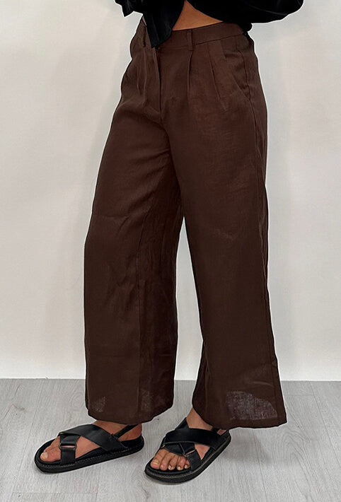 Edith Linen Culottes in chocolate is 100% Linen with elastic waistband at back, only slightly cropped,  button and zip enclosure at front and 2 side pockets