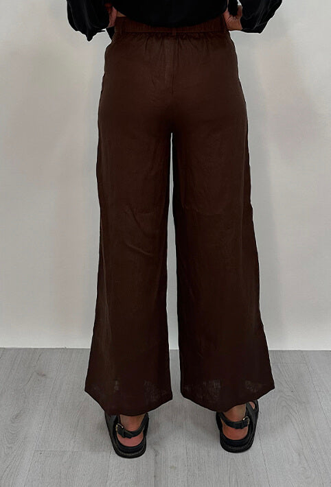 Edith Linen Culottes in chocolate is 100% Linen with elastic waistband at back, only slightly cropped,  button and zip enclosure at front and 2 side pockets