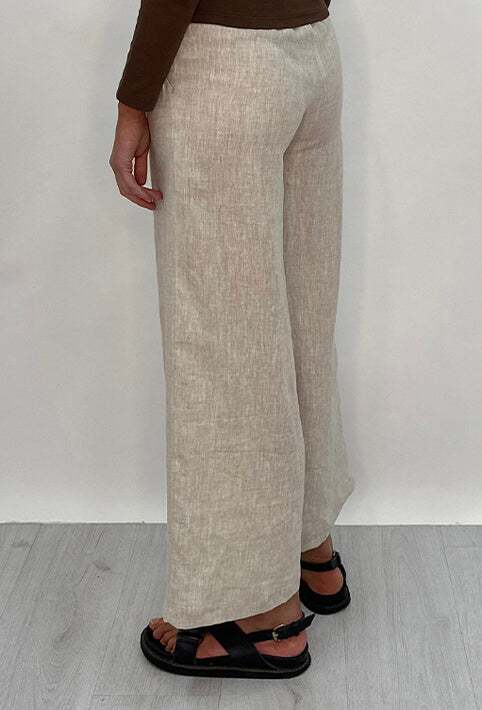 Edith Linen Culottes in beige is 100% Linen with elastic waistband at back, only slightly cropped,  button and zip enclosure at front and 2 side pockets