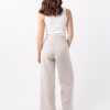 The Alice Pant in oatmeal is a full length pant made in 100% premium flax linen with 2 front pleats, 2 side pockets, belt loops and an invisible zip at the back. 