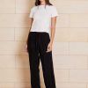 The Chloe Cupro pant features cupro and viscose blended fabrication with a velvety soft handfeel that creates a draping look, a drawcord waistband, straight leg design with side pockets.
