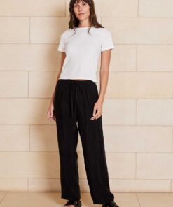 The Chloe Cupro pant features cupro and viscose blended fabrication with a velvety soft handfeel that creates a draping look, a drawcord waistband, straight leg design with side pockets.