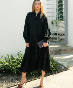 The Daisy Linen Midi Dress in black is made from 100% linen, It's overised layers drape over the body flowing effortlessly.
