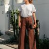 Edith Linen Culottes in chocolate is 100% Linen with elastic waistband at back, only slightly cropped,  button and zip enclosure at front and 2 side pockets