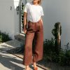 Edith Linen Culottes in chocolate is 100% Linen with elastic waistband at back, only slightly cropped,  button and zip enclosure at front and 2 side pockets