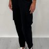 Athena Linen Cargo Pant in black is 100% Linen, elastic waistband at back, belt loops, slightly tapered towards the hem, 2 Pockets at back, 2 Pockets on side leg