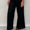 Edith Linen Culottes in black is 100% Linen with elastic waistband at back, only slightly cropped,  button and zip enclosure at front and 2 side pockets