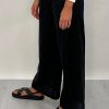 Edith Linen Culottes in black is 100% Linen with elastic waistband at back, only slightly cropped,  button and zip enclosure at front and 2 side pockets