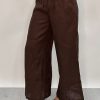 Edith Linen Culottes in chocolate is 100% Linen with elastic waistband at back, only slightly cropped,  button and zip enclosure at front and 2 side pockets