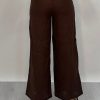 Edith Linen Culottes in chocolate is 100% Linen with elastic waistband at back, only slightly cropped,  button and zip enclosure at front and 2 side pockets
