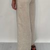 Edith Linen Culottes in beige is 100% Linen with elastic waistband at back, only slightly cropped,  button and zip enclosure at front and 2 side pockets