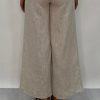 Edith Linen Culottes in beige is 100% Linen with elastic waistband at back, only slightly cropped,  button and zip enclosure at front and 2 side pockets
