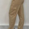 Athena Linen Cargo Pant in beige is 100% Linen, elastic waistband at back, belt loops, slightly tapered towards the hem, 2 Pockets at back, 2 Pockets on side leg