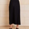 The Lily Skirt in black features a ruched split detailing that adds both shape and texture, functional ruching with tie leg splits and invisible zip back seam.