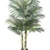 Artificial golden palm tree with arching metallic fronds and sculpted trunk